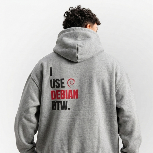 Person wearing a gray hoodie with text on the back, standing against a white background